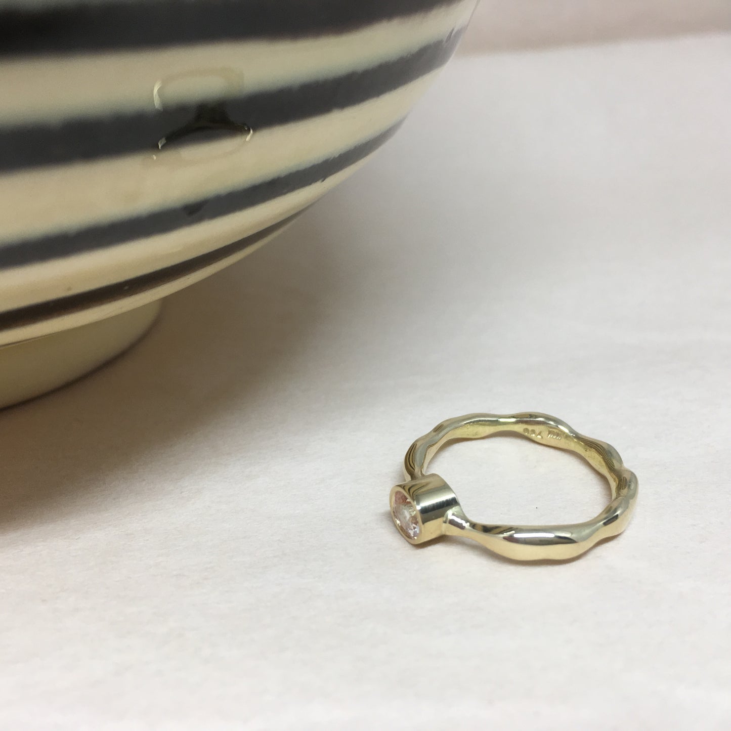 Liquid ring with sapphire.