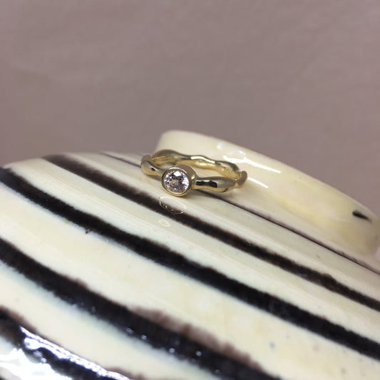 Liquid ring with sapphire.