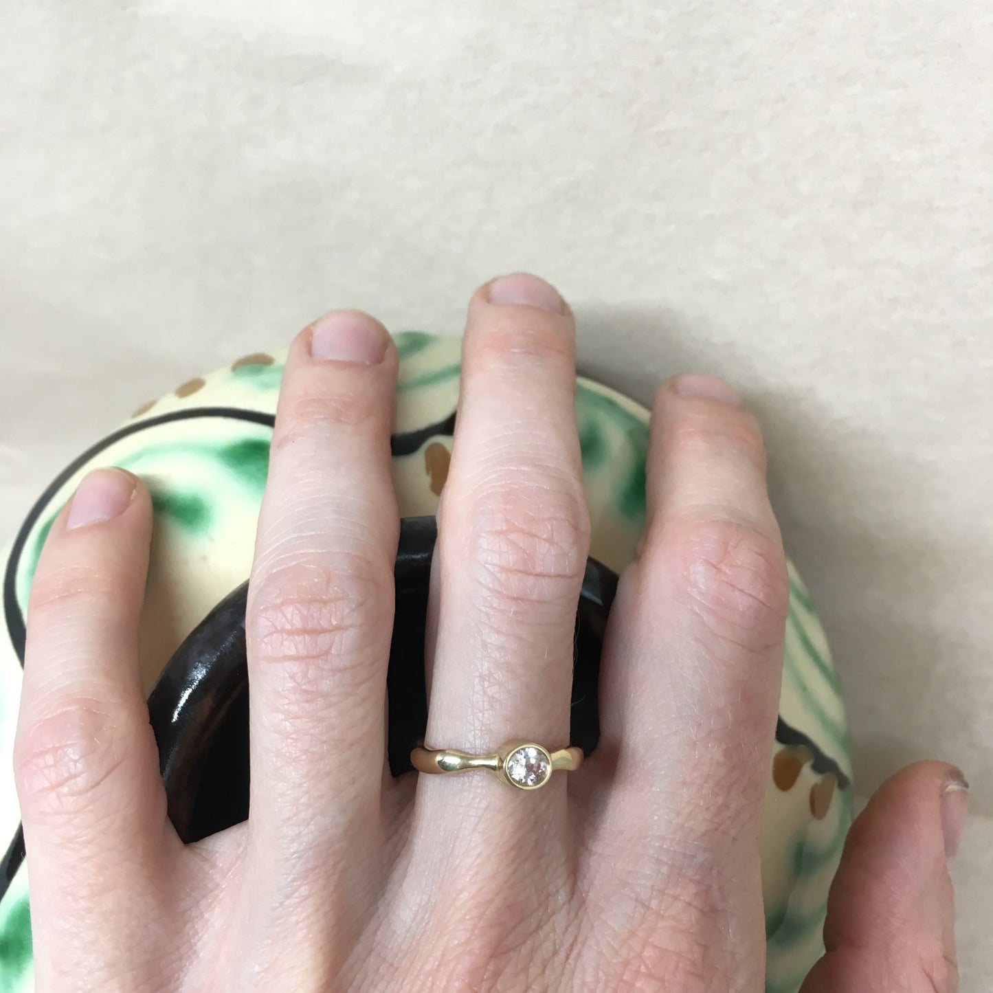 Liquid ring with sapphire.